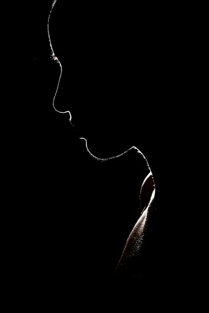 silhouette of a woman's profile.