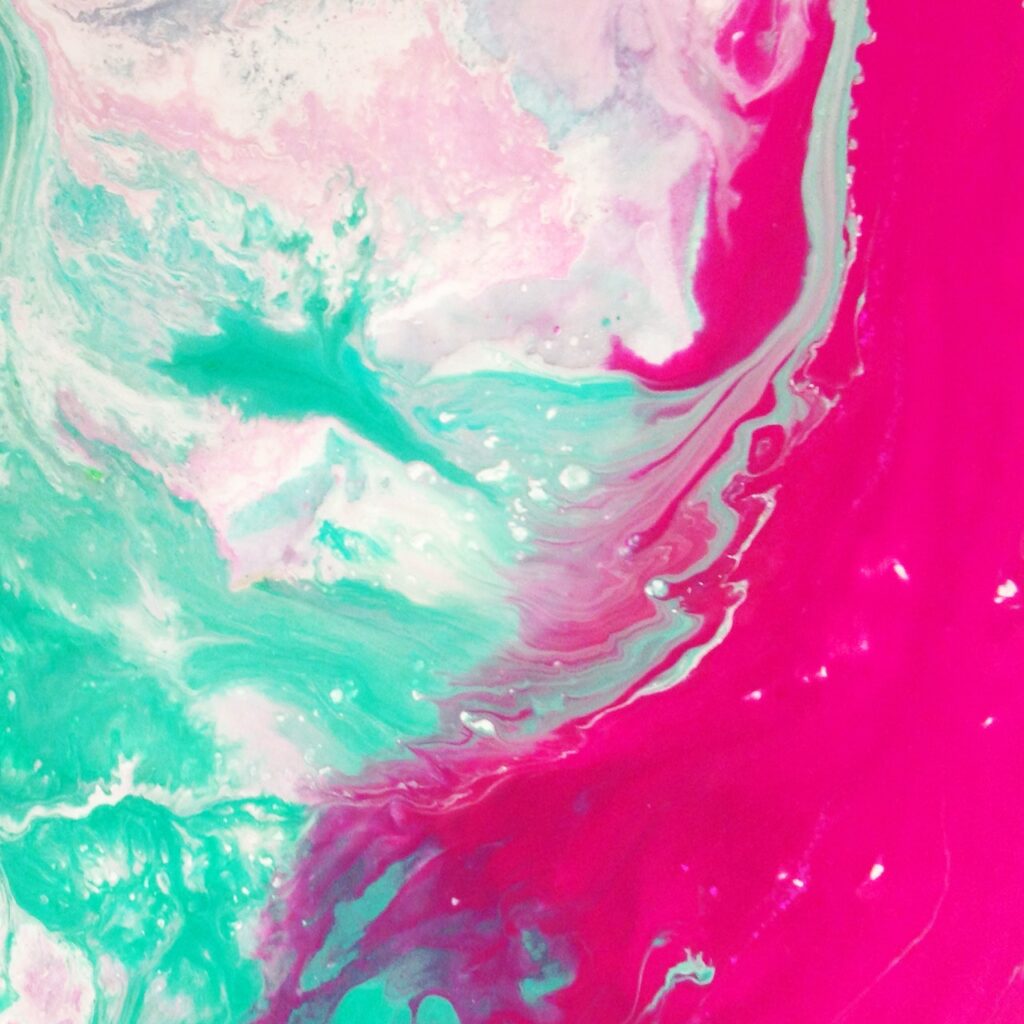 abstract painting of swirling turquoise, white, and pink.
